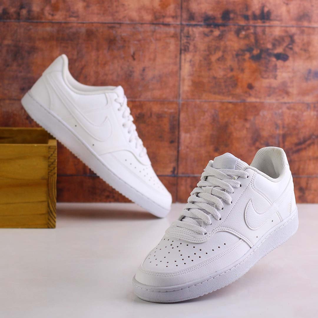 Tenis nike branco hot sale de couro feminino