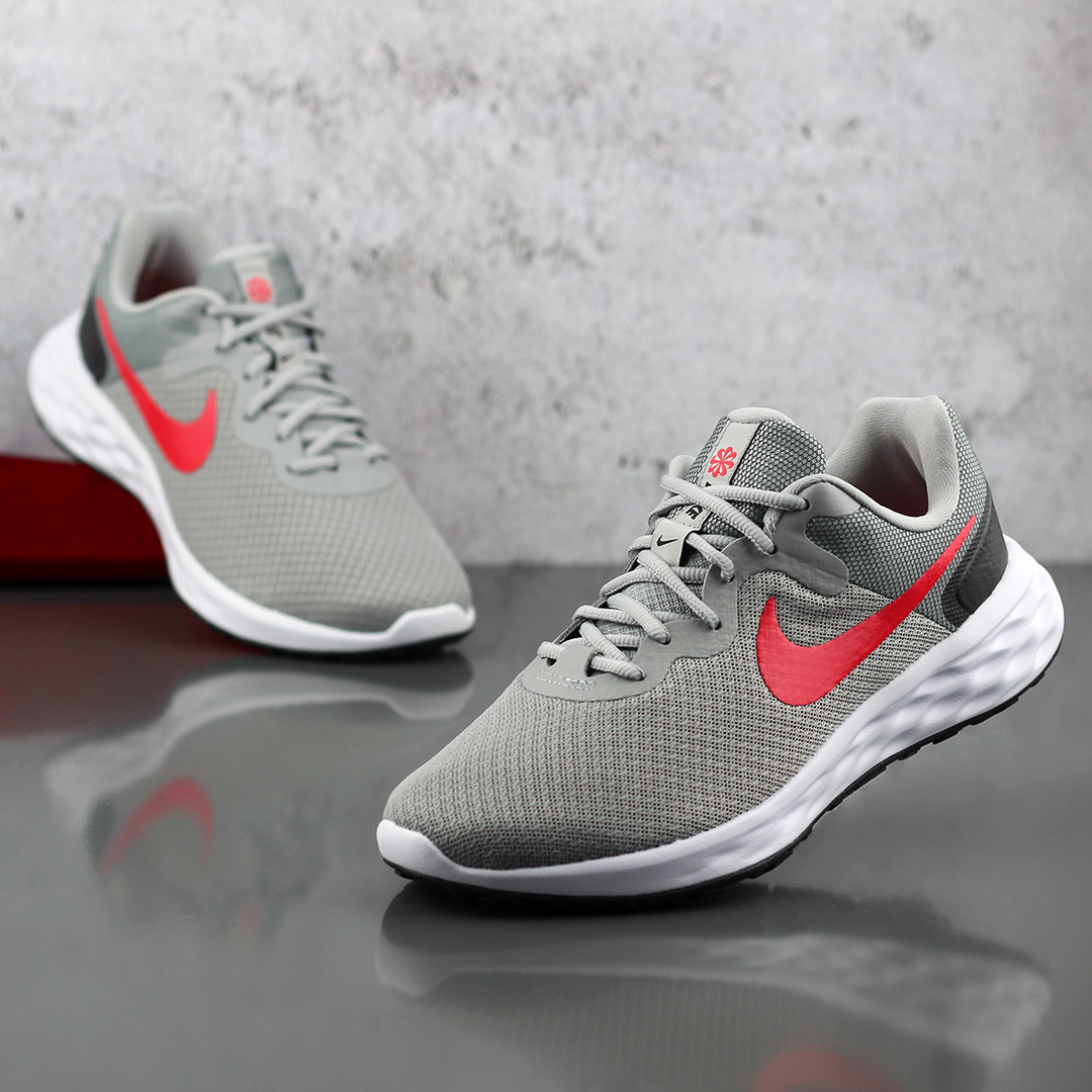 Nike run best sale revolution 4 trainers